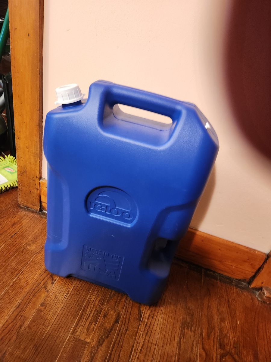6 Gallon Igloo water jug.  Great for camping.  Never used.