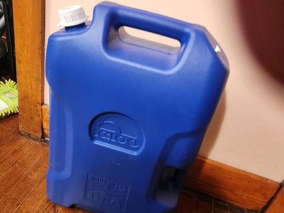6 Gallon Igloo water jug. Great for camping. Never used.