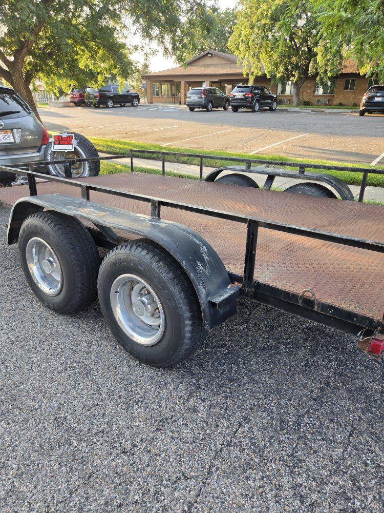 Dual Axle Flatbed Utility Trailer with Diamond Plate Deck