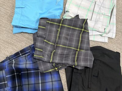 (4) Nike and (1) puma golf shorts size 34