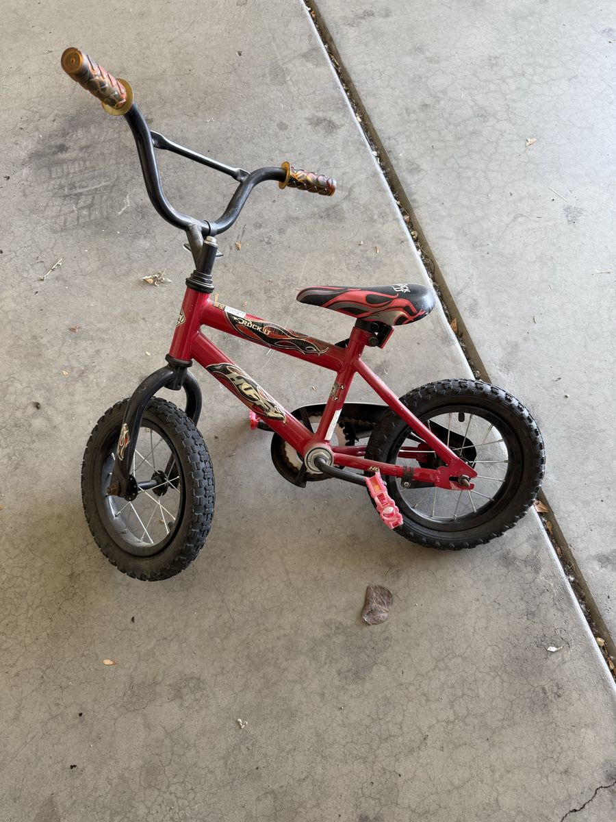 Toddler bicycle (w/ one training wheel)