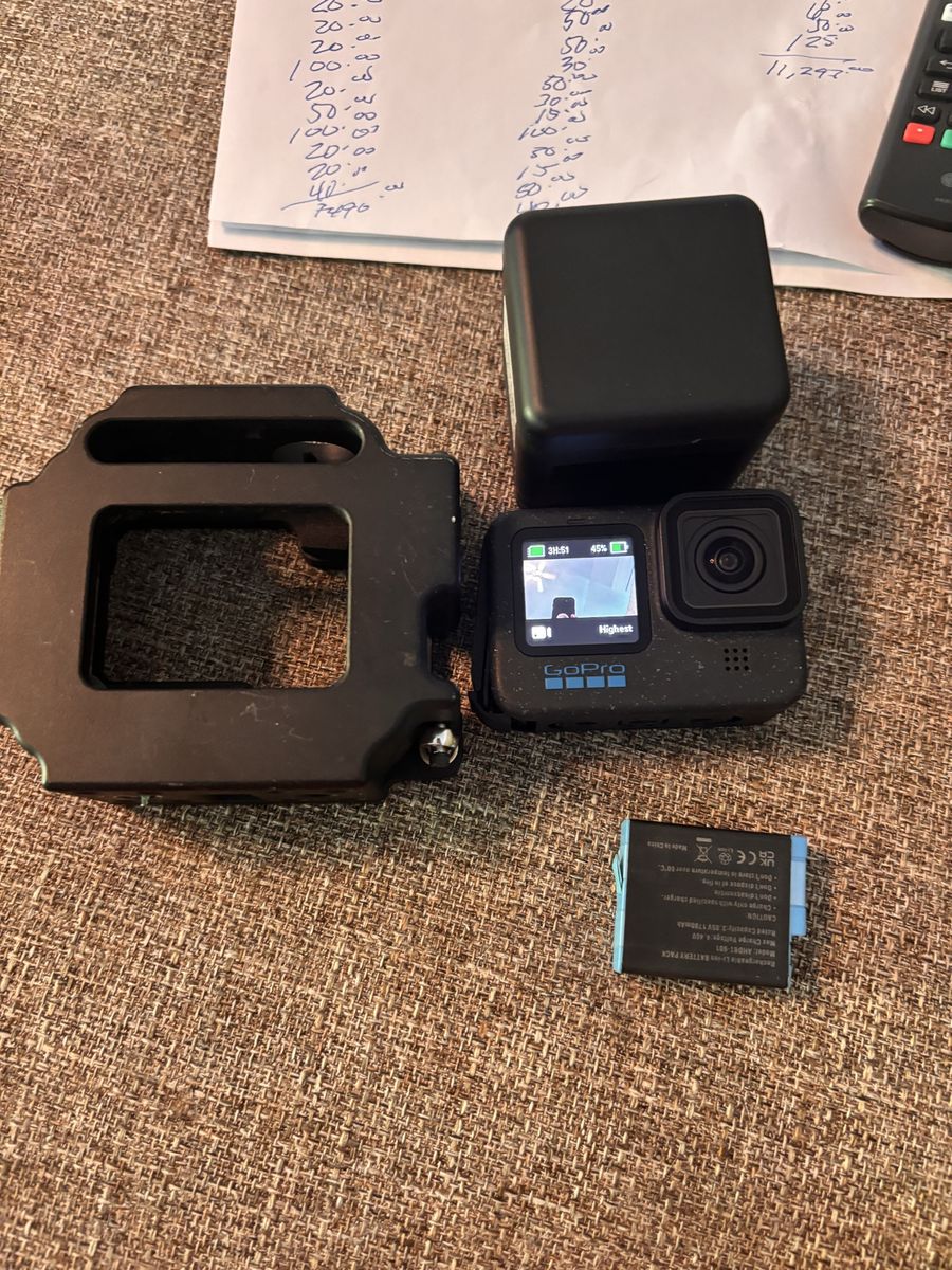 GoPro HERO 12  Action Camera with Batteries, Charger, and Protective Frame Case like new 