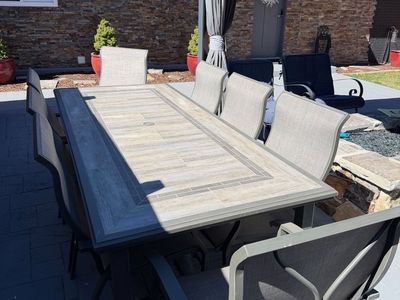 Like new 8 person Patio Table and Chairs