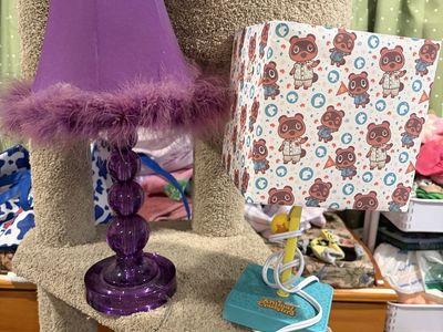 Novelty Table Lamp Lot: Animal Crossing Tom Nook Lamp and Purple Feathered Accent Lamp