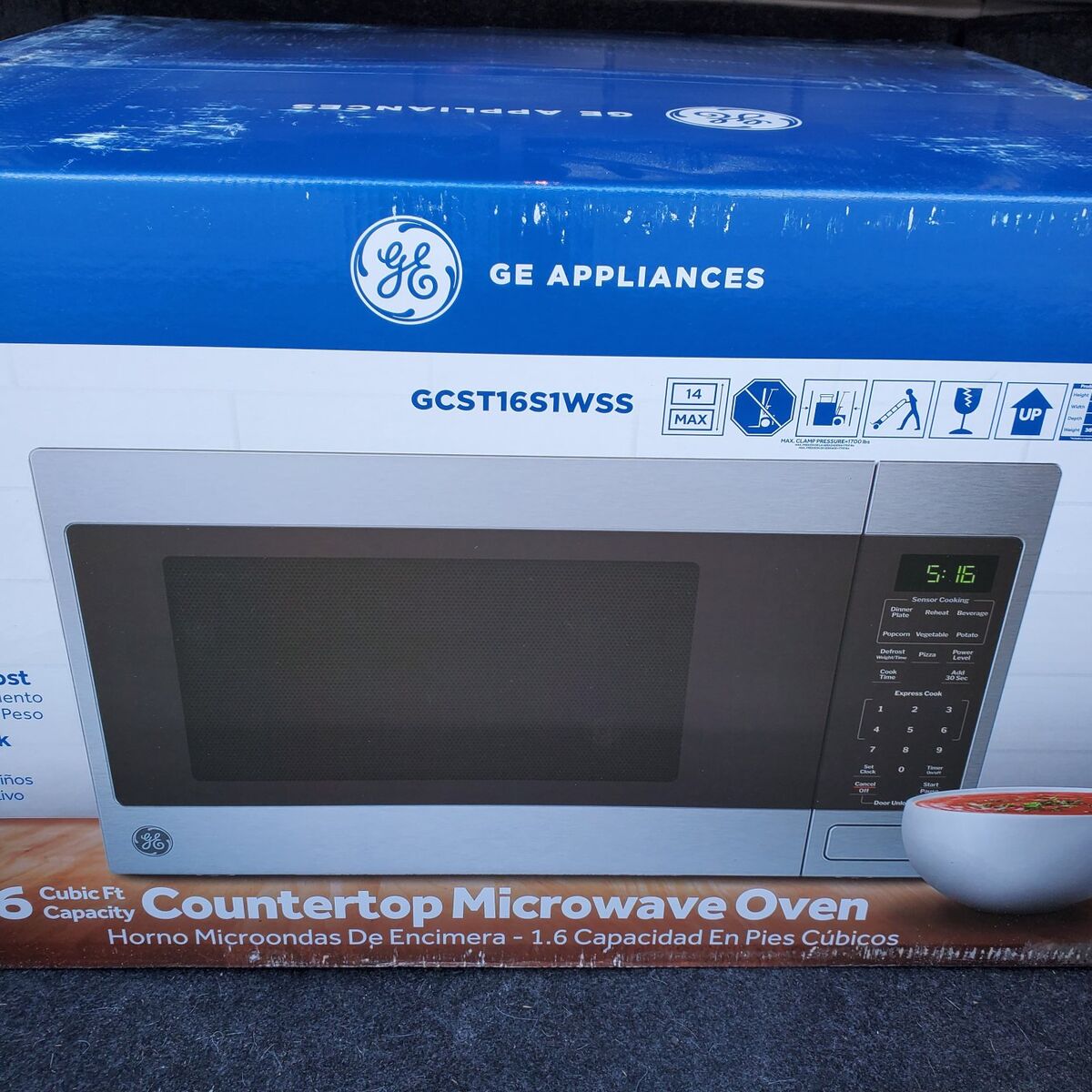 New GE 1.6 Cubic Ft Countertop Microwave