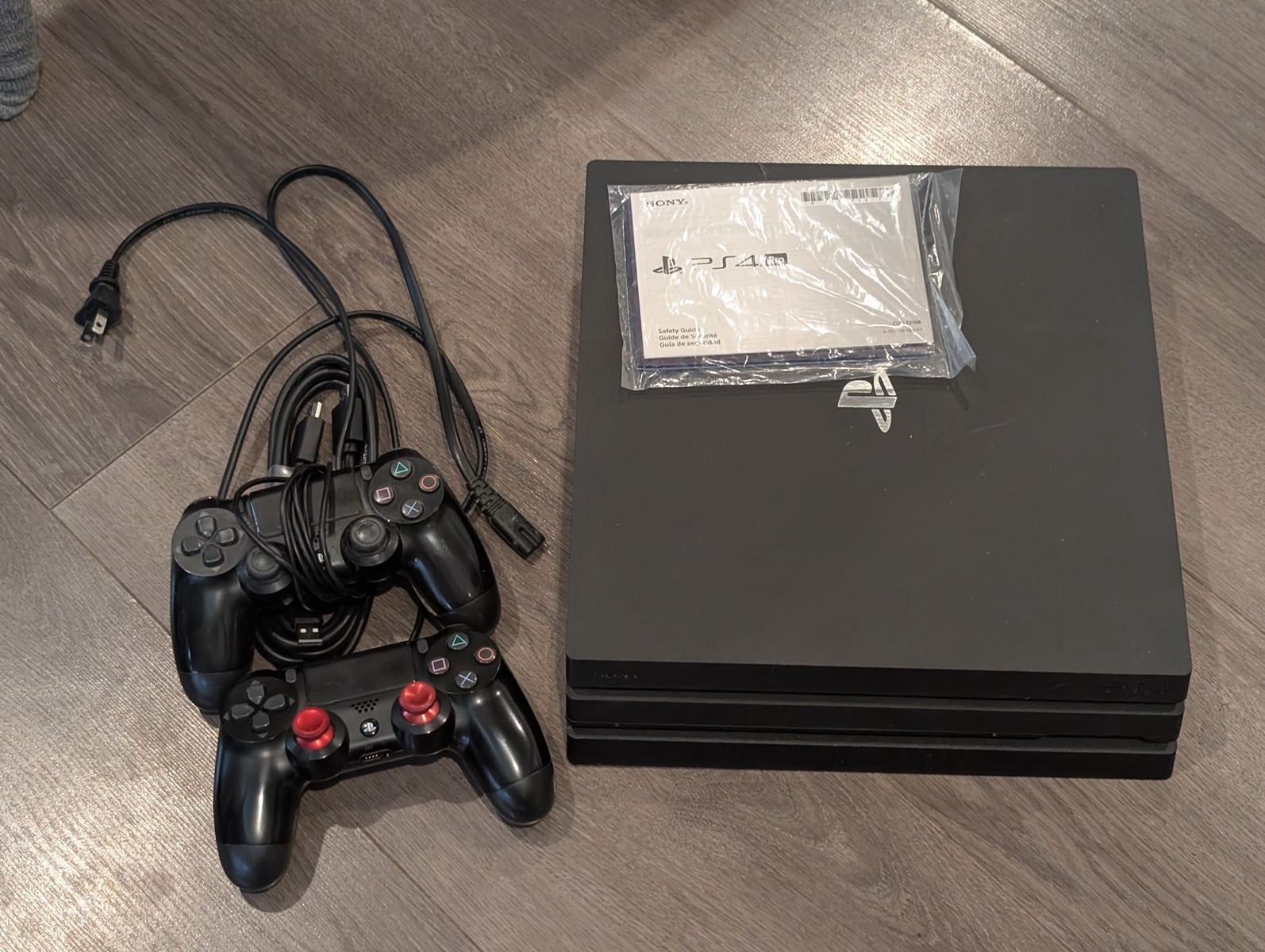 PlayStation 4 PS4 Pro 1tb w/ two controllers