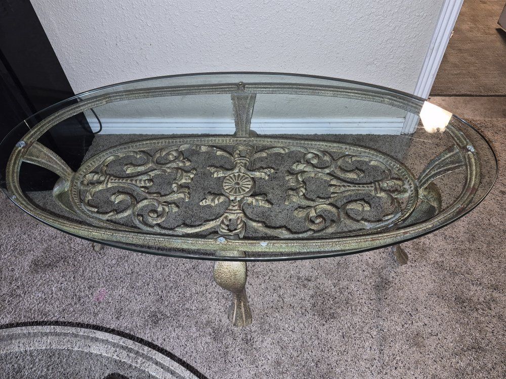 Vintage Oval Glass Top Coffee Table with Ornate Metal Scroll Base