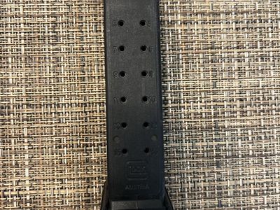 Used Glock 19 Gen 2 15 round magazine w/ factory 2+ extension