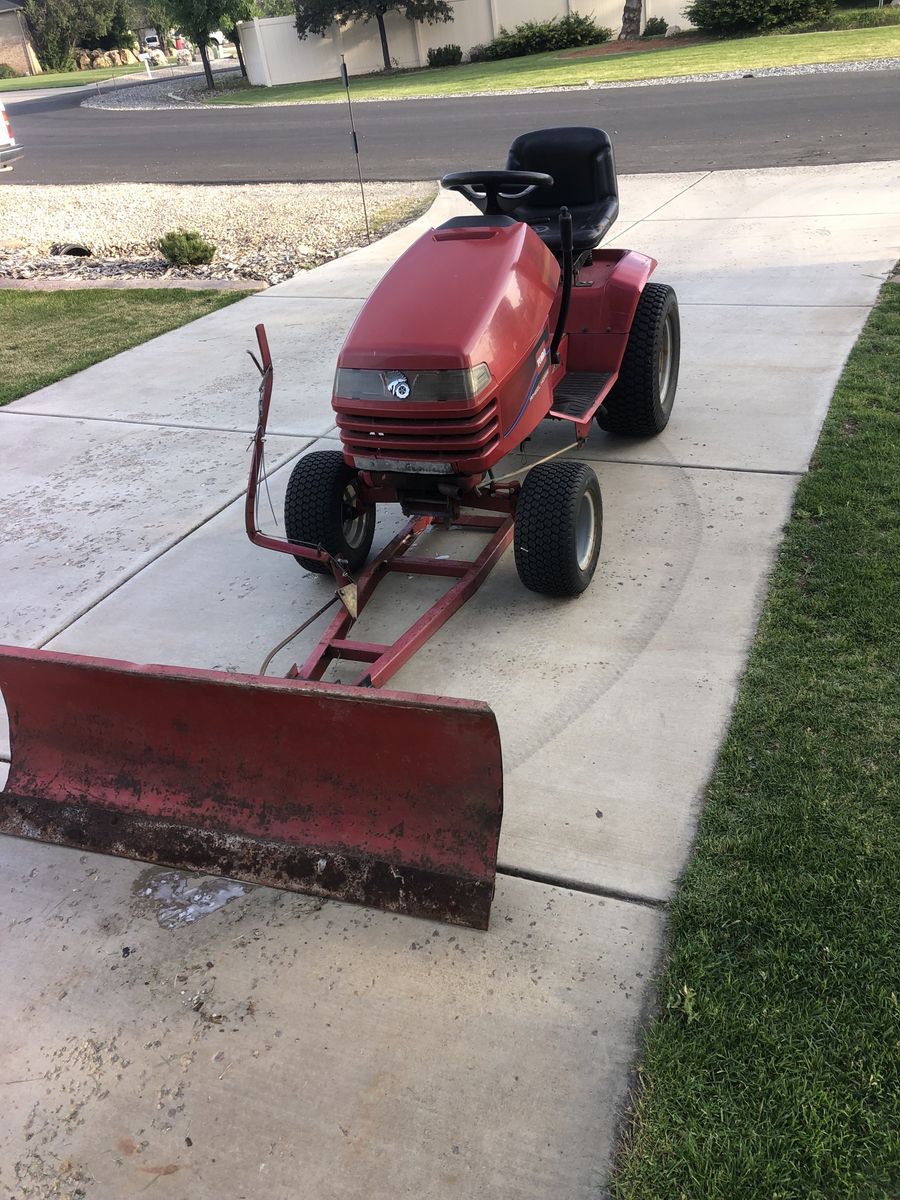 Toro lawn tractor with plow