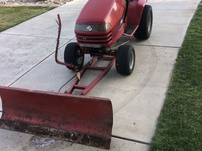 Toro lawn tractor with plow