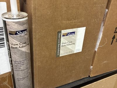 Cove base adhesive