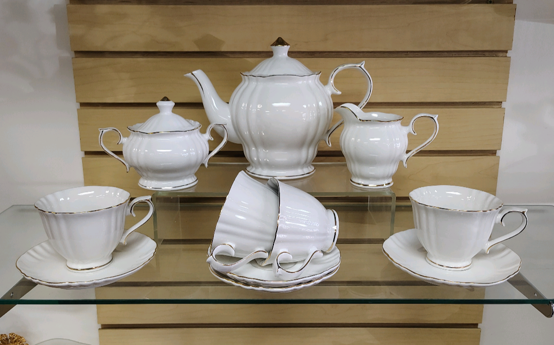 11pc Porcelain Tea / Coffee set ( NEW ) white & gold. 1 teapot , 4 cups & 4 Saucers, 1 creamer & sugar
