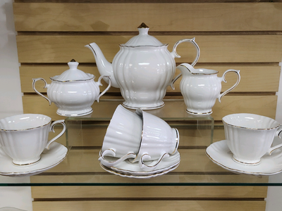 11pc Porcelain Tea / Coffee set ( NEW ) white & gold. 1 teapot , 4 cups & 4 Saucers, 1 creamer & sugar