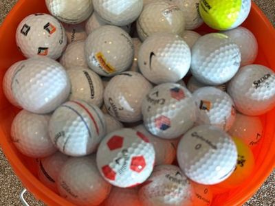 120 golf balls in new bucket