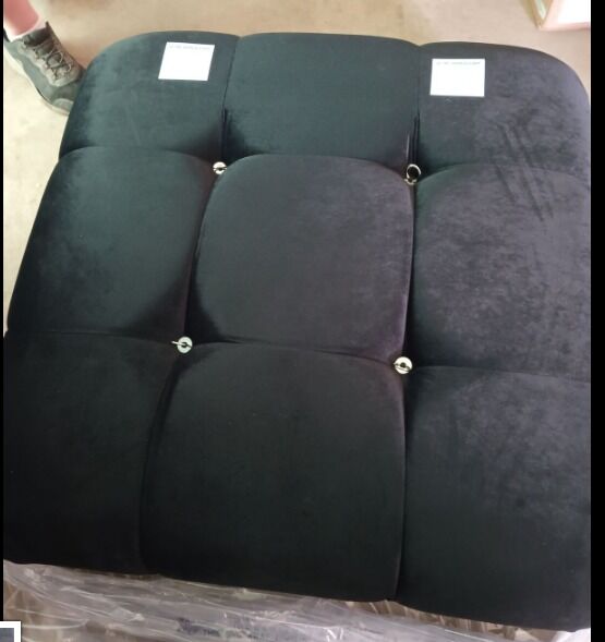Beautiful velvet style black ottoman chair