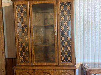 1970's Vintage Wooden China Cabinet featuring a distinct Mid-Century Mediterranean / Spanish Revival design