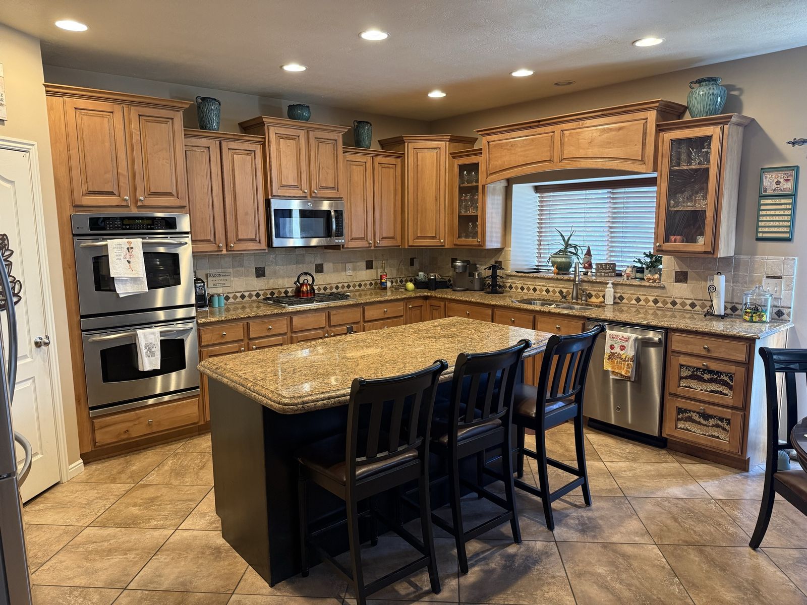 Complete kitchen with countertops and appliances  