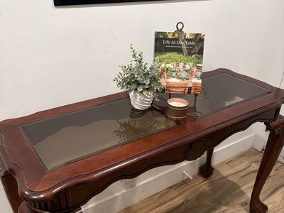 Ornate Wood Console Table with Glass Top - Carved Details & Elegant Design