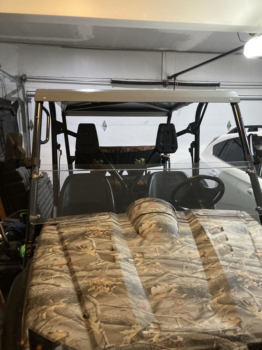 Half windshield for a Yamaha rhino.
