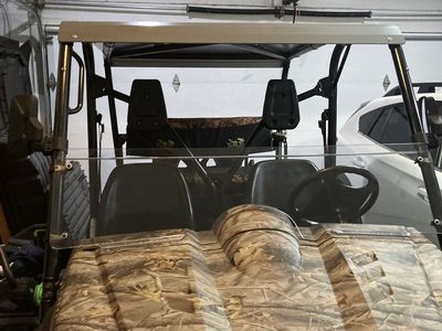 Half windshield for a Yamaha rhino.