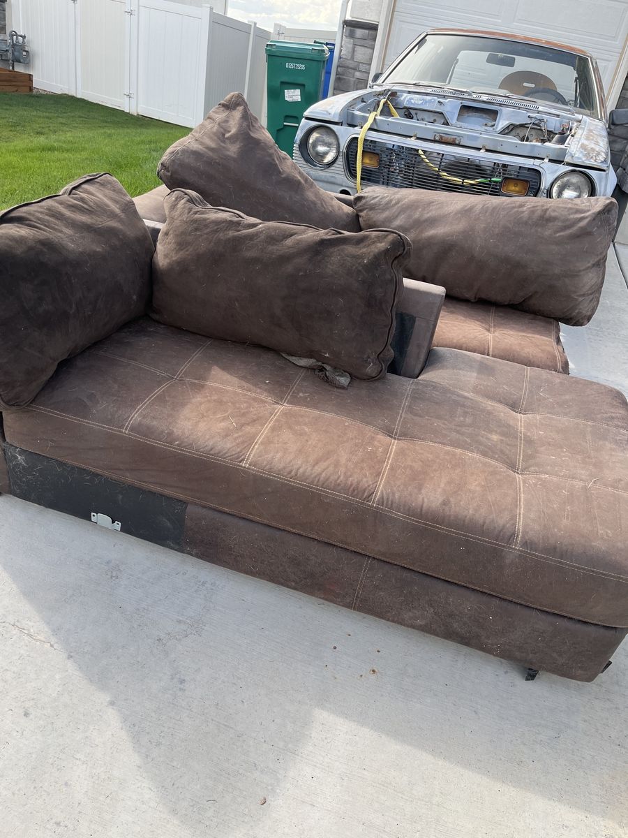 Brown Fabric Sectional Sofa and Black Leather Chaise Lounge
