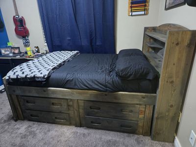 Full size bed with storage and shelves