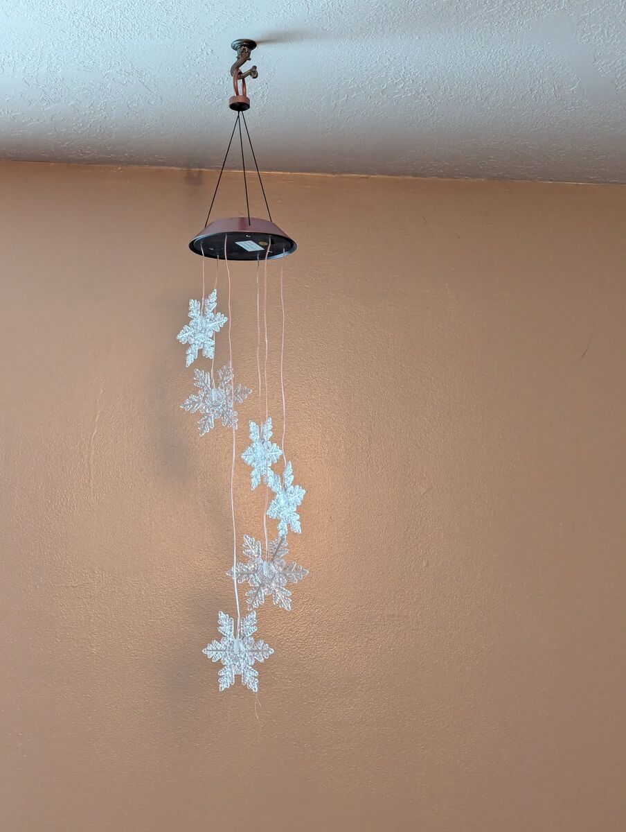 Solar Lighted Snowflakes And Santa's
