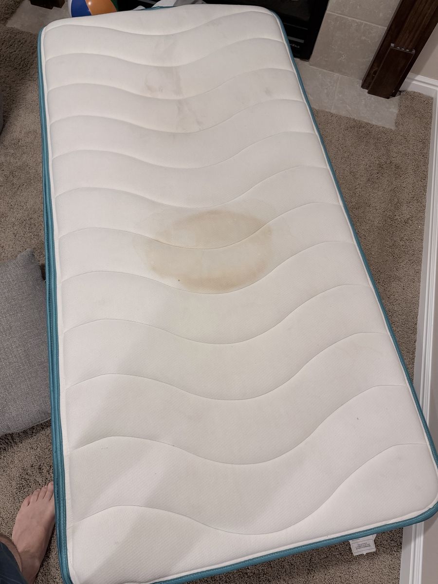 Twin Size Mattress - White with Blue Trim - Used - Needs Cleaning