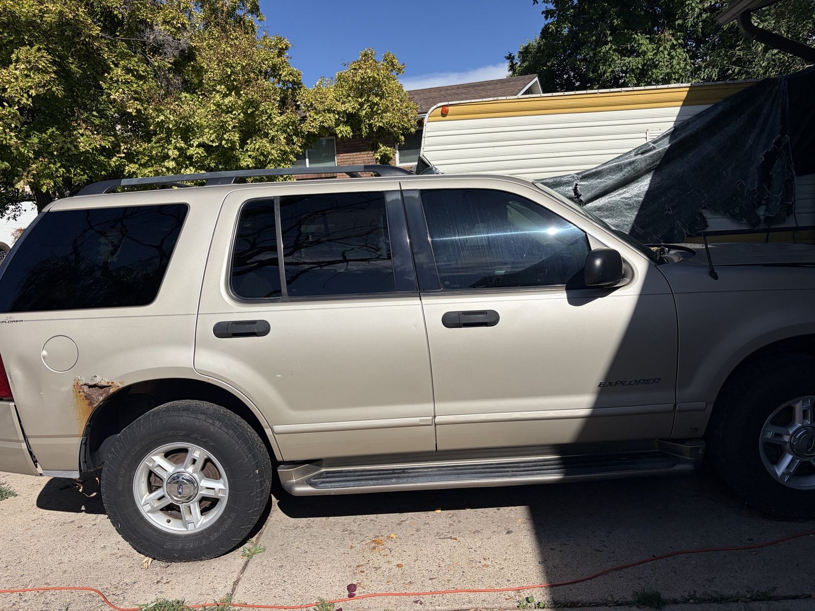 Gold Ford Explorer SUV - Used Condition