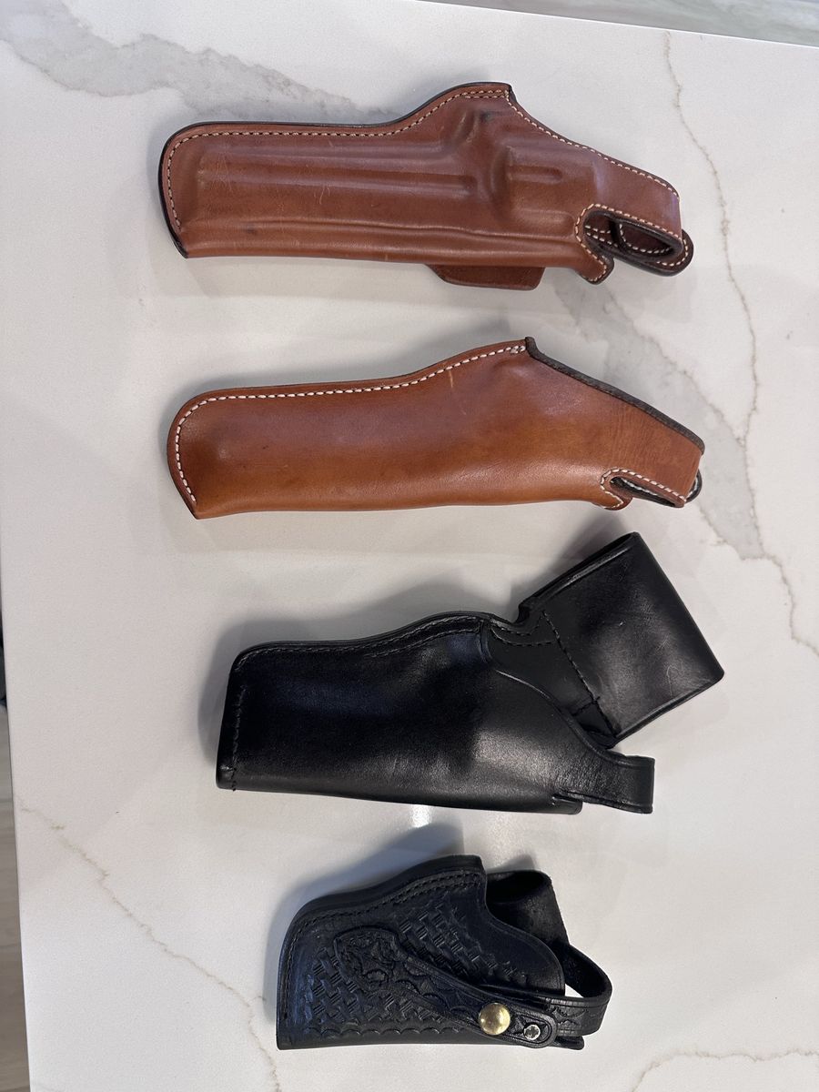 Leather pistol holsters