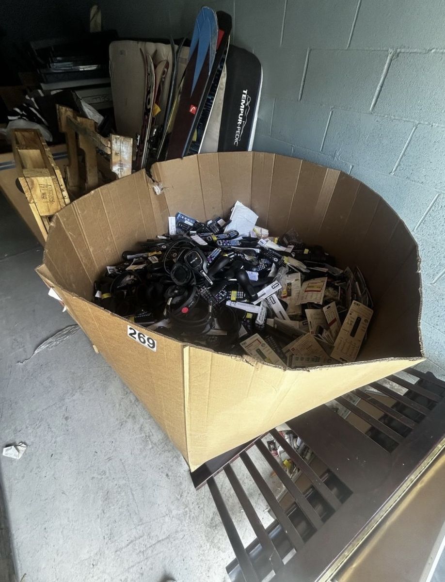Storage unit clearance clean out pallet of remotes