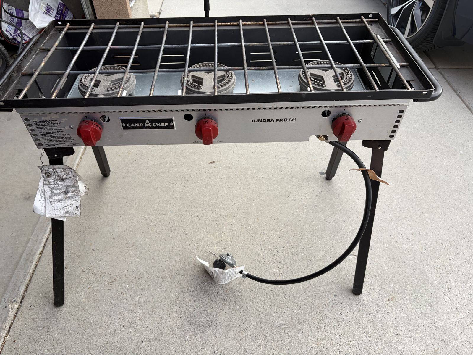 Camp stove with griddle