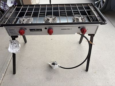 Camp stove with griddle