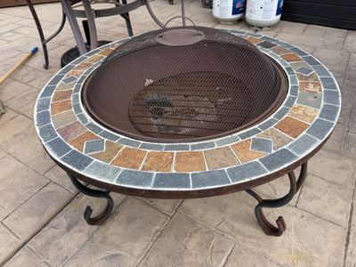 Wood burning metal fire pit