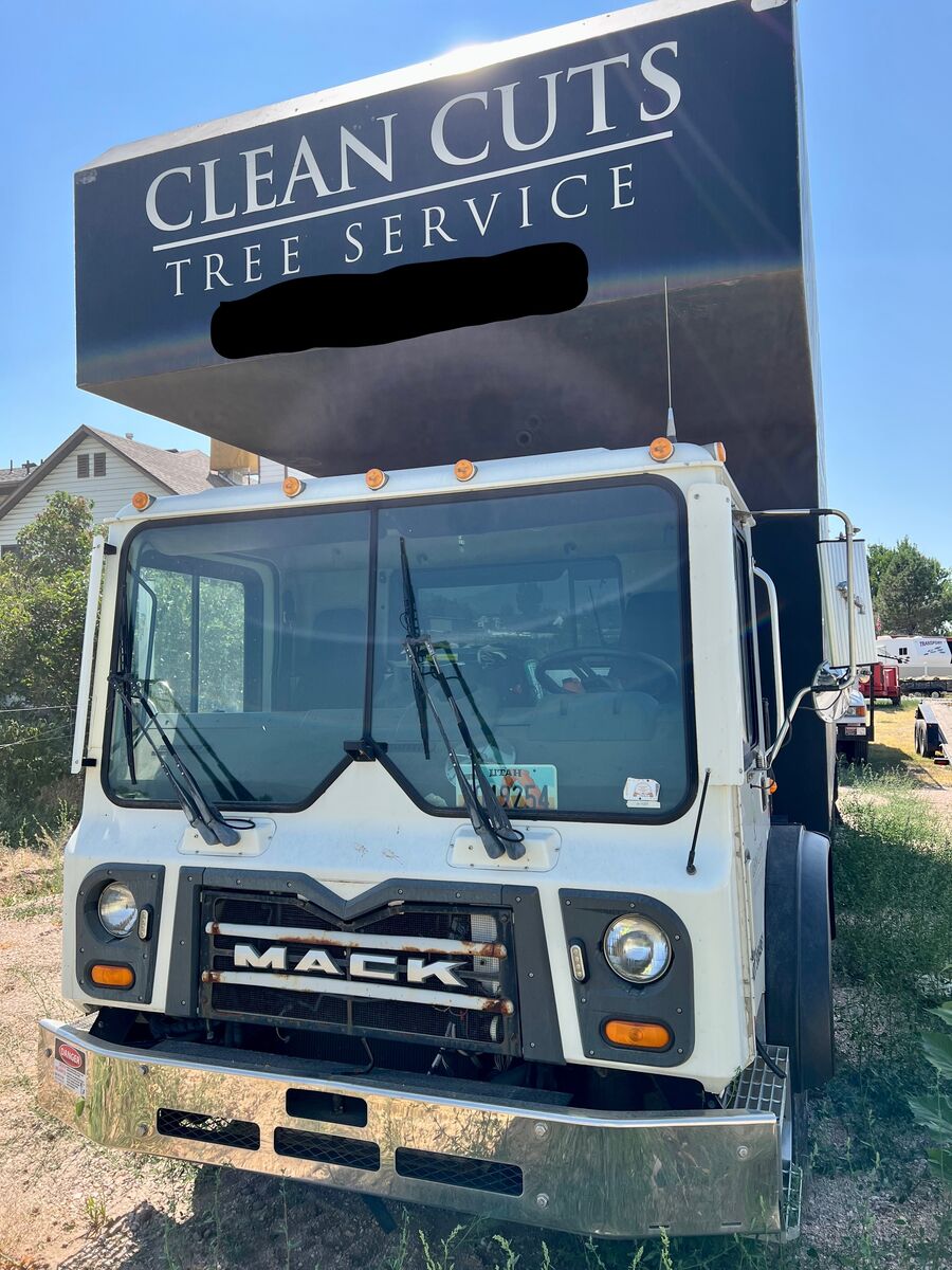 Extremely low Mile Mack Rear Mount Grapple Truck **Automatic Tranny**