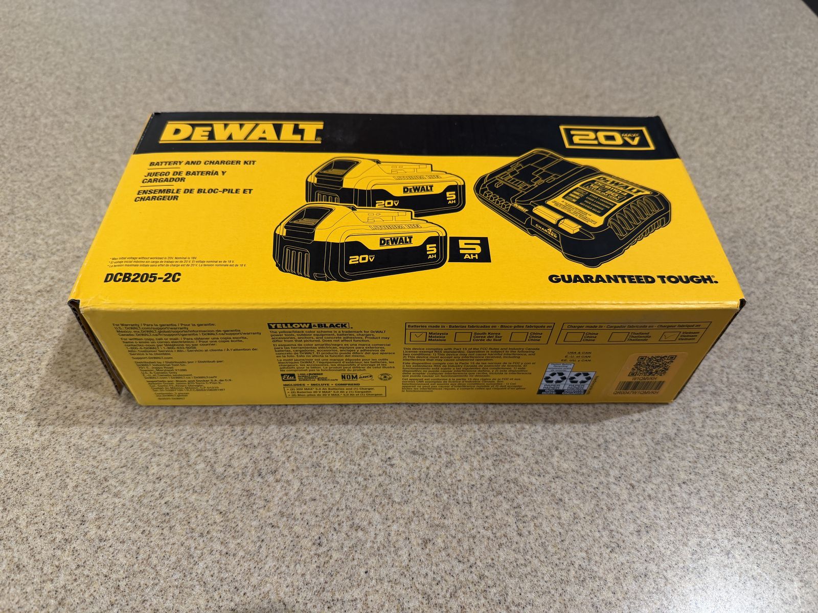 Brand new Dewalt 20V MAX charger and two 5AH batteries