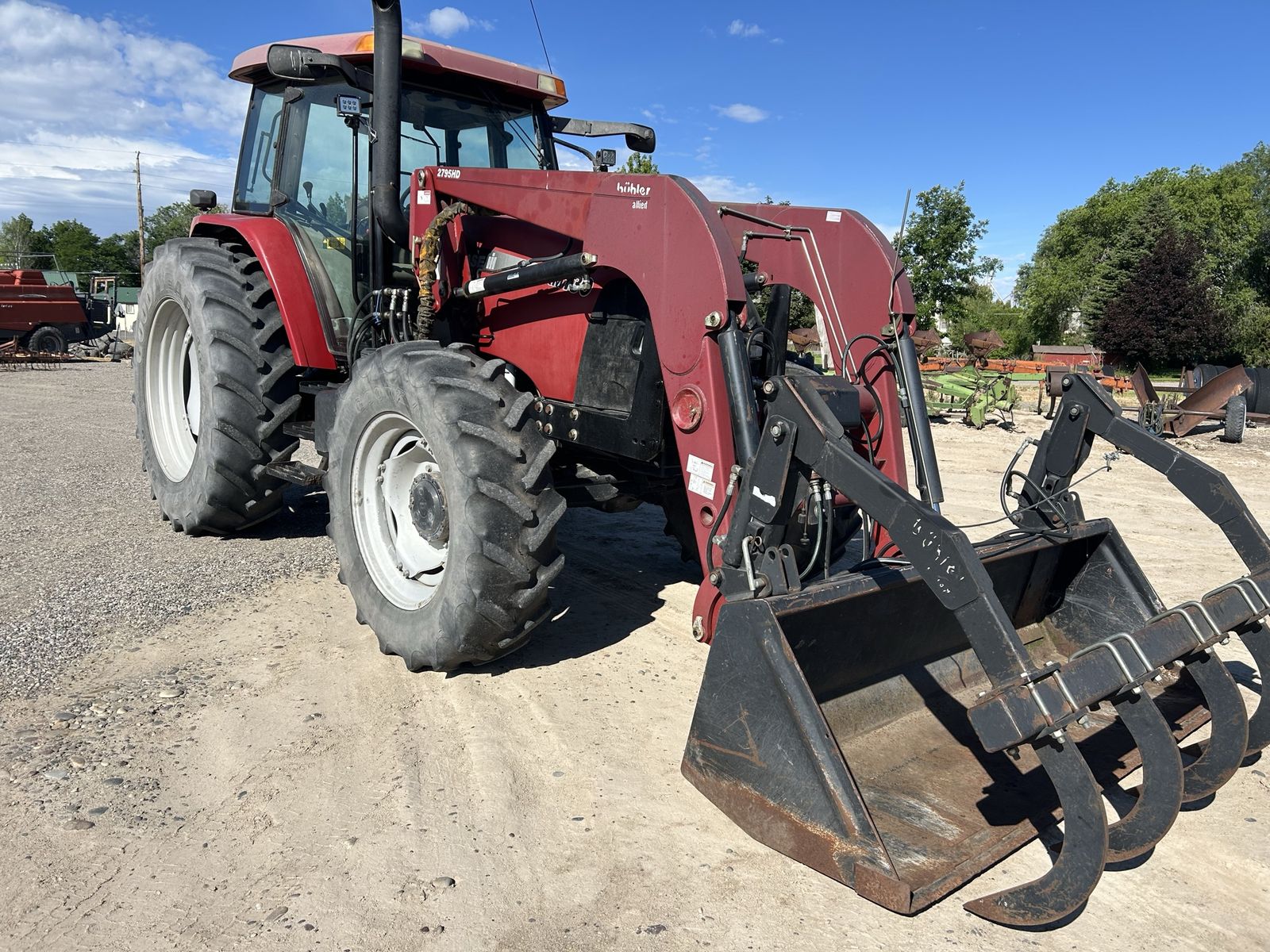 Used Case IH MXM130 Tractor with Buhler Allied Loader and Grapple Bucket