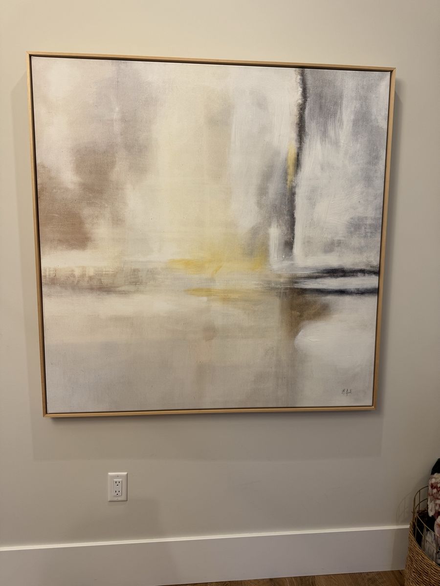 Framed canvas art piece