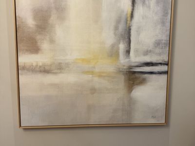 Framed canvas art piece