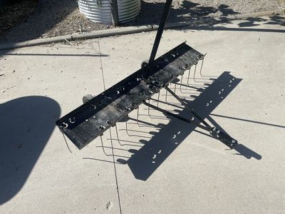 Agri-Fab lawn de-thatcher pull-behind attachment