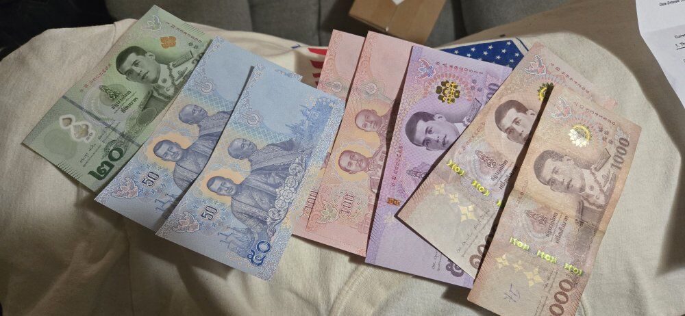 Crisp uncirculated Thai baht