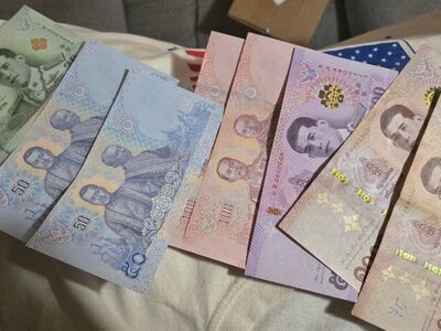 Crisp uncirculated Thai baht