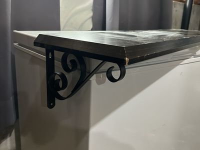 Decorative Dark Brown Wooden Wall Shelf with Dark brown Iron Scroll Brackets