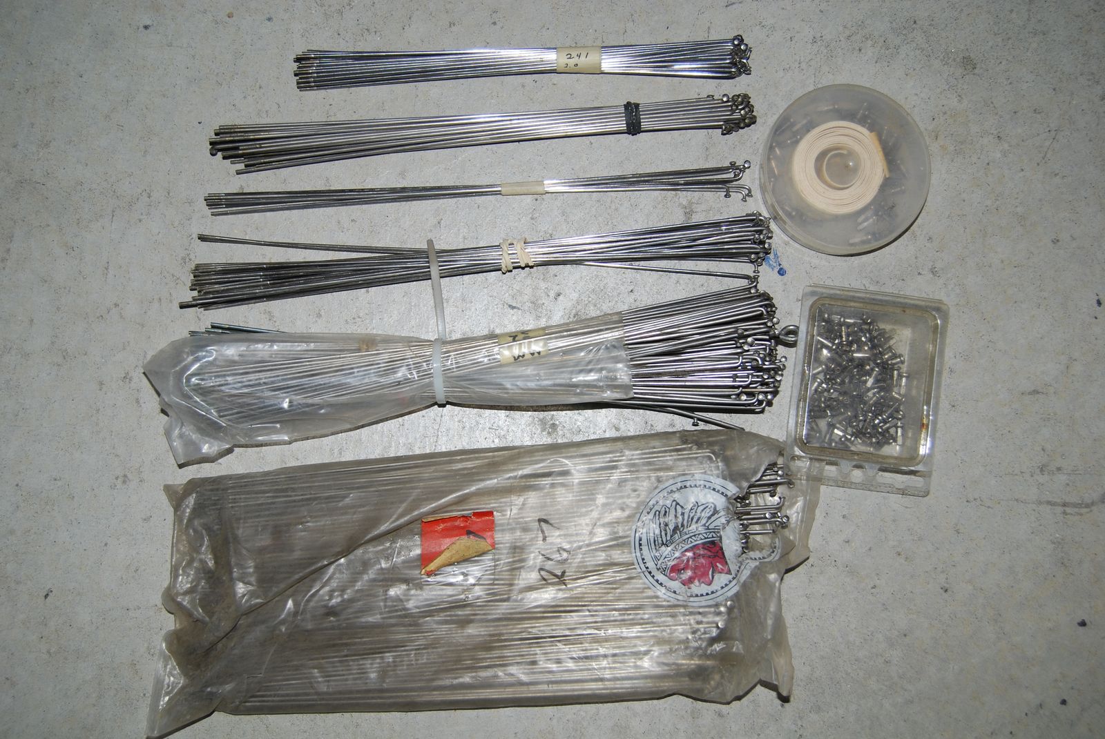 Lots of spokes new and used with nipples.