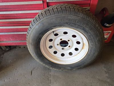 A spare trailer tire