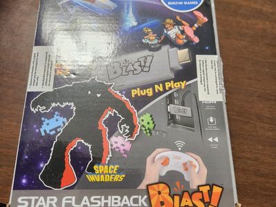 Video Game System - AT Games 12 built-in games. Wiresless. Plugs in remotely with an HDMI stick (Like a Roku stick).