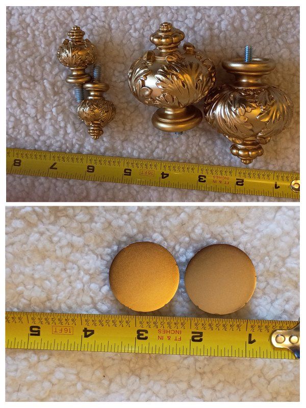 three sets of curtain rod ends