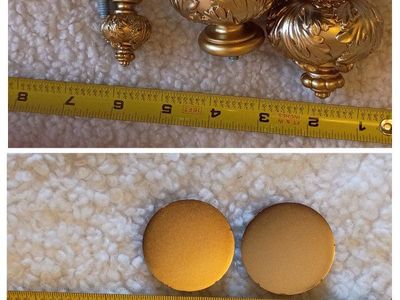 three sets of curtain rod ends