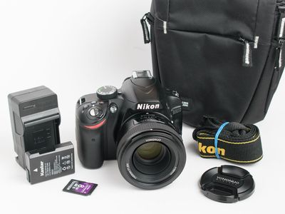 Nikon D3200 24.2Mp camera with Yongnuo 50mm f/1.8 lens. Works great!