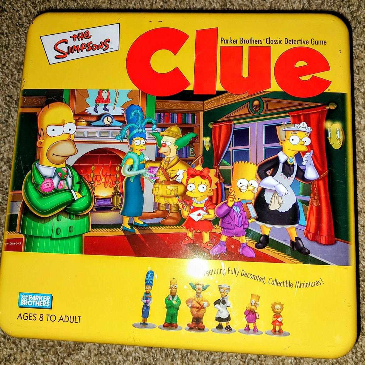 The Simpsons Clue Game metal tin